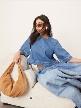 ARRANGE denim crop tab detail top in light wash blue size 6